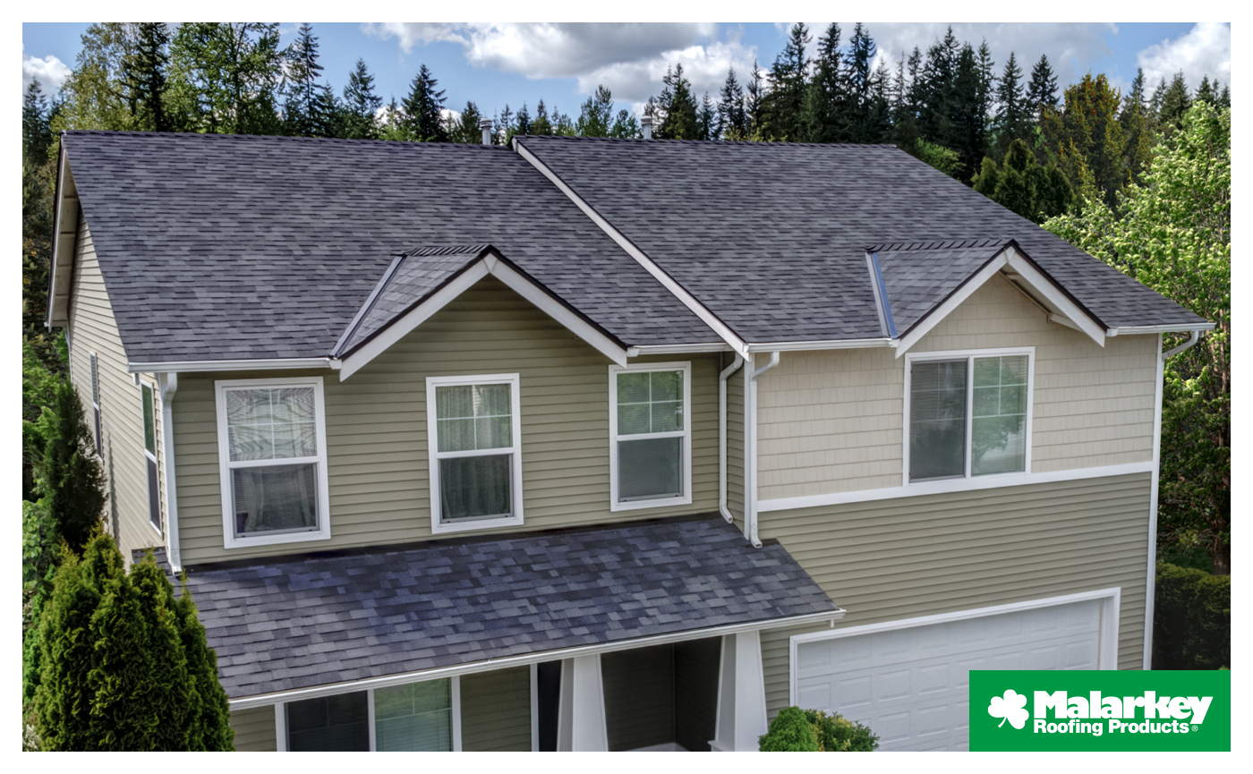 Home with Malarkey Roofing Products Midnight Black Vista Shingles.
